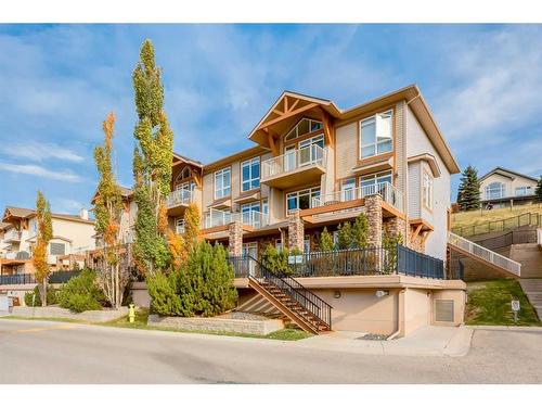 9-148 Rockyledge View Nw, Calgary, AB - Outdoor With Balcony With Facade