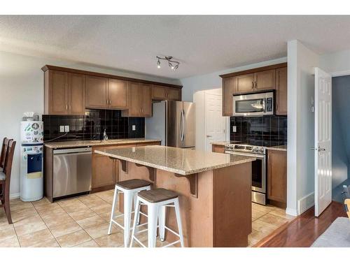 1019 Windhaven Close Sw, Airdrie, AB - Indoor Photo Showing Kitchen With Stainless Steel Kitchen