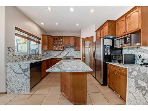 180 Panatella Close Nw, Calgary, AB - Indoor Photo Showing Kitchen With Double Sink