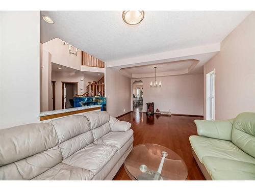 180 Panatella Close Nw, Calgary, AB - Indoor Photo Showing Living Room