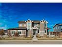 245 Riverwood Crescent Sw, Diamond Valley, AB  - Outdoor With Facade 