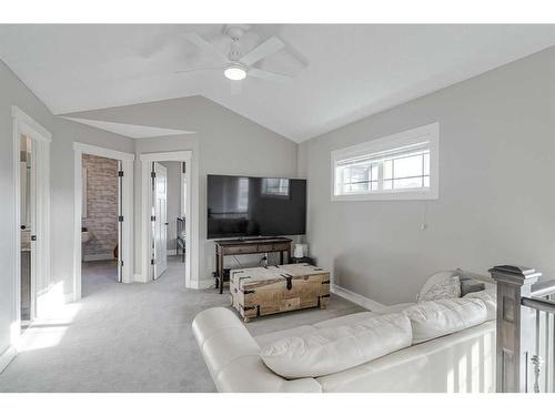 245 Riverwood Crescent Sw, Diamond Valley, AB - Indoor Photo Showing Living Room