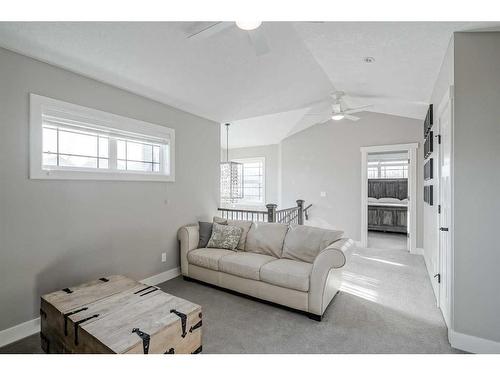 245 Riverwood Crescent Sw, Diamond Valley, AB - Indoor Photo Showing Living Room