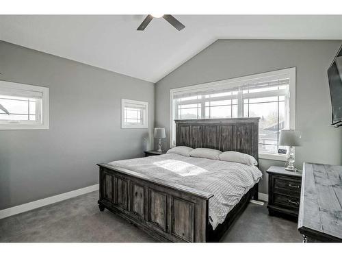 245 Riverwood Crescent Sw, Diamond Valley, AB - Indoor Photo Showing Bedroom