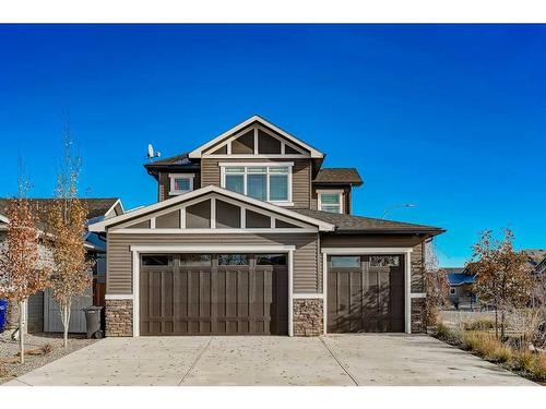 245 Riverwood Crescent Sw, Diamond Valley, AB - Outdoor With Facade