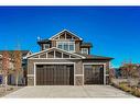 245 Riverwood Crescent Sw, Diamond Valley, AB  - Outdoor With Facade 