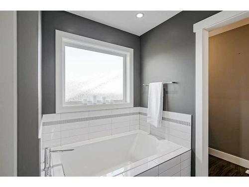 245 Riverwood Crescent Sw, Diamond Valley, AB - Indoor Photo Showing Bathroom