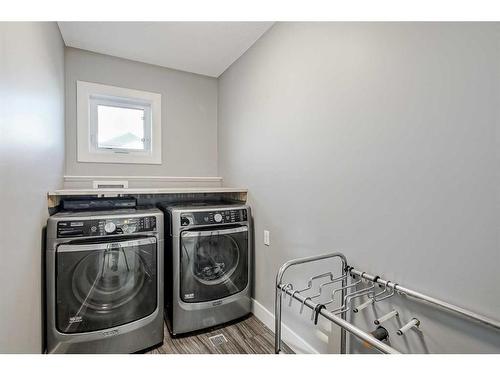 245 Riverwood Crescent Sw, Diamond Valley, AB - Indoor Photo Showing Laundry Room