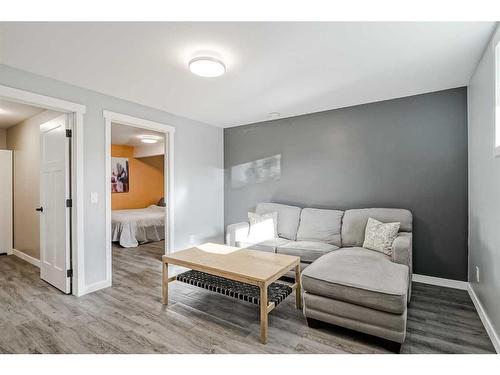 245 Riverwood Crescent Sw, Diamond Valley, AB - Indoor Photo Showing Living Room