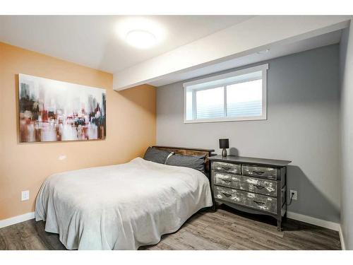 245 Riverwood Crescent Sw, Diamond Valley, AB - Indoor Photo Showing Bedroom