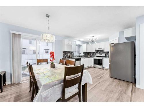 250 Luxstone Road Sw, Airdrie, AB - Indoor Photo Showing Dining Room