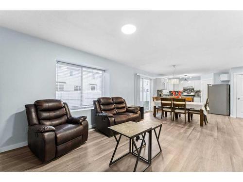 250 Luxstone Road Sw, Airdrie, AB - Indoor Photo Showing Living Room