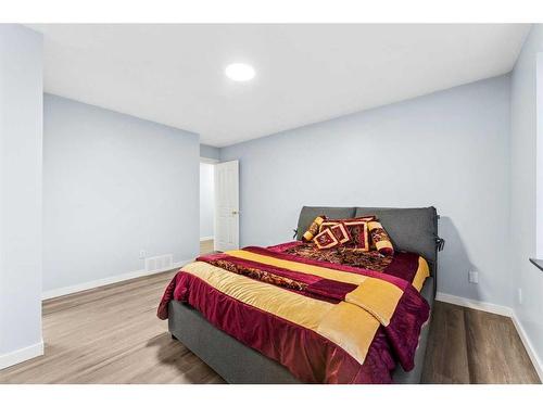 250 Luxstone Road Sw, Airdrie, AB - Indoor Photo Showing Bedroom