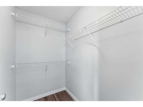 250 Luxstone Road Sw, Airdrie, AB - Indoor With Storage