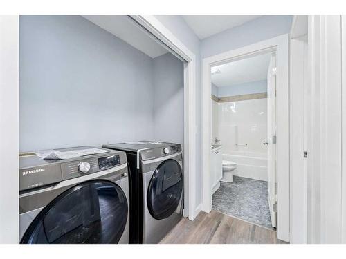 250 Luxstone Road Sw, Airdrie, AB - Indoor Photo Showing Laundry Room