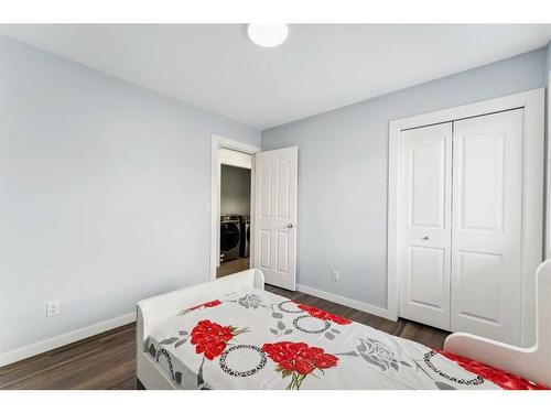 250 Luxstone Road Sw, Airdrie, AB - Indoor Photo Showing Bedroom