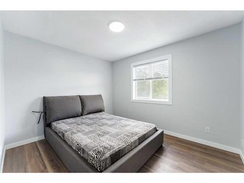 250 Luxstone Road Sw, Airdrie, AB - Indoor Photo Showing Bedroom