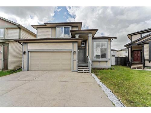 250 Luxstone Road Sw, Airdrie, AB - Outdoor With Facade