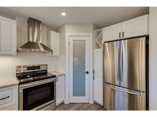 80 Woodglen Close Sw, Calgary, AB - Indoor Photo Showing Kitchen With Stainless Steel Kitchen