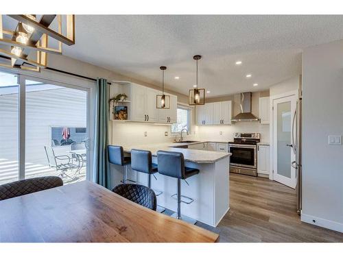 80 Woodglen Close Sw, Calgary, AB - Indoor Photo Showing Kitchen With Upgraded Kitchen