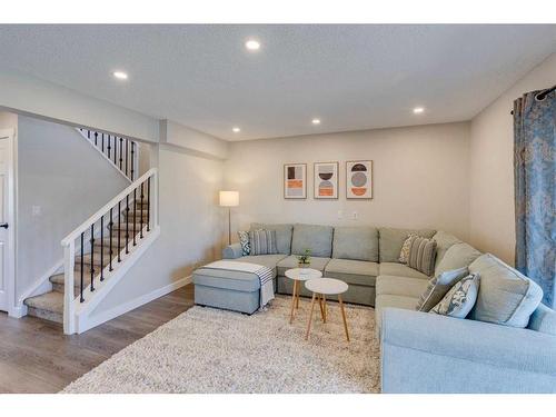 80 Woodglen Close Sw, Calgary, AB - Indoor Photo Showing Living Room