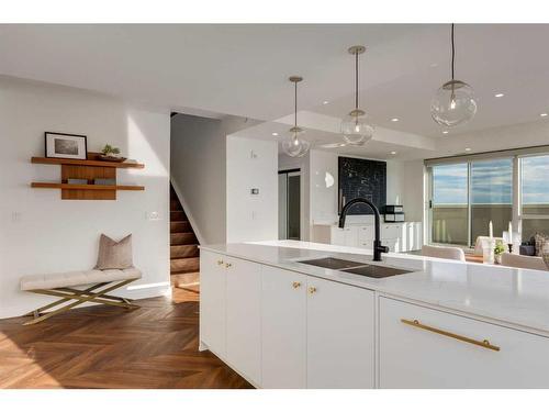 701-8505 Broadcast Avenue Sw, Calgary, AB - Indoor Photo Showing Kitchen With Double Sink