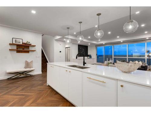 701-8505 Broadcast Avenue Sw, Calgary, AB - Indoor Photo Showing Kitchen With Double Sink