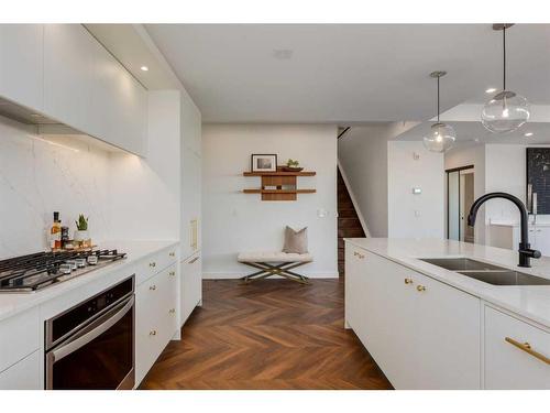 701-8505 Broadcast Avenue Sw, Calgary, AB - Indoor Photo Showing Kitchen With Double Sink With Upgraded Kitchen