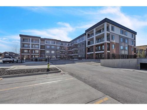 3105-111 Wolf Creek Drive Se, Calgary, AB - Outdoor With Balcony With Facade