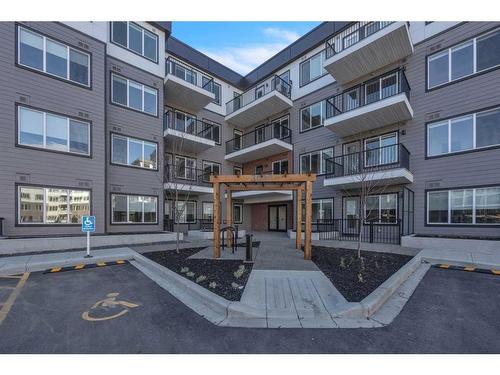 3105-111 Wolf Creek Drive Se, Calgary, AB - Outdoor With Balcony With Facade