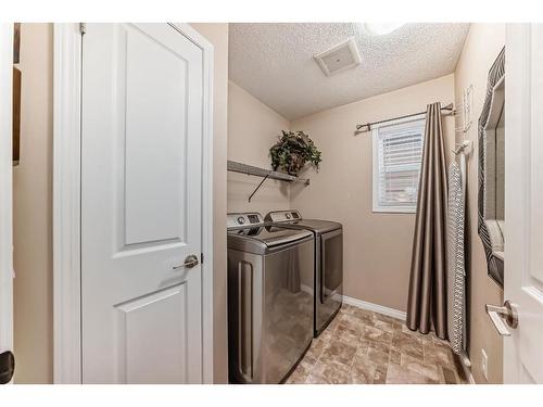 38 Auburn Crest Green Se, Calgary, AB - Indoor Photo Showing Laundry Room