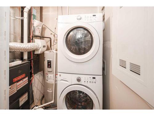 6-35 West Coach Manor Sw, Calgary, AB - Indoor Photo Showing Laundry Room