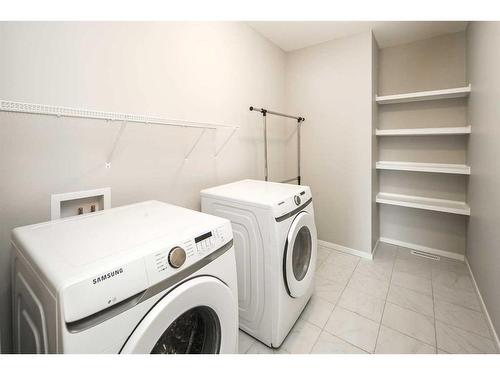 181 Carrington Crescent Nw, Calgary, AB - Indoor Photo Showing Laundry Room