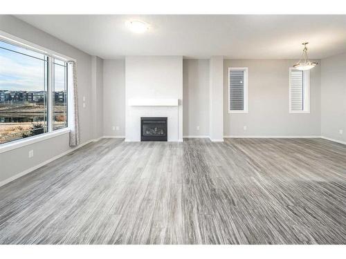 181 Carrington Crescent Nw, Calgary, AB - Indoor Photo Showing Living Room With Fireplace