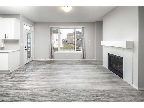 181 Carrington Crescent Nw, Calgary, AB - Indoor With Fireplace