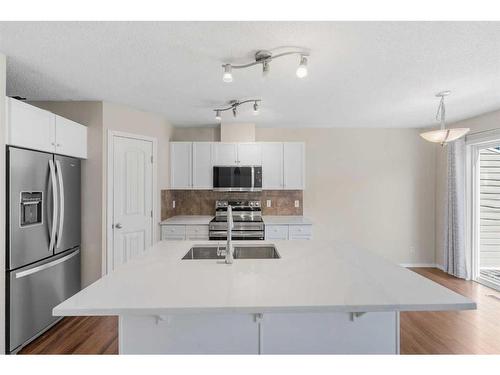 503-800 Yankee Valley Boulevard Se, Airdrie, AB - Indoor Photo Showing Kitchen With Upgraded Kitchen