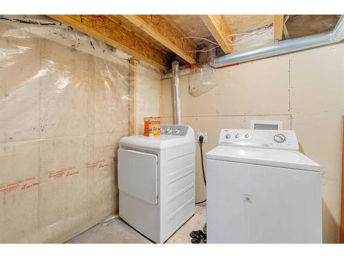 503-800 Yankee Valley Boulevard Se, Airdrie, AB - Indoor Photo Showing Laundry Room