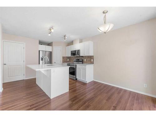 503-800 Yankee Valley Boulevard Se, Airdrie, AB - Indoor Photo Showing Kitchen