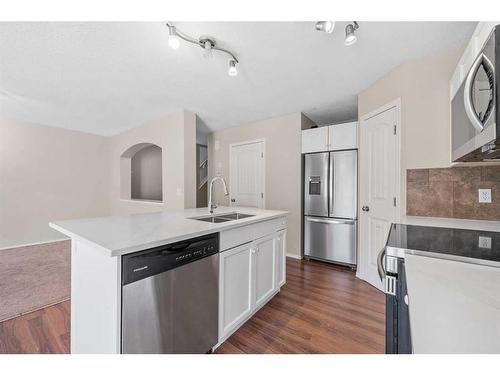 503-800 Yankee Valley Boulevard Se, Airdrie, AB - Indoor Photo Showing Kitchen With Double Sink