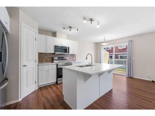 503-800 Yankee Valley Boulevard Se, Airdrie, AB - Indoor Photo Showing Kitchen With Upgraded Kitchen