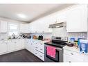 55 Falchurch Road Ne, Calgary, AB  - Indoor Photo Showing Kitchen 