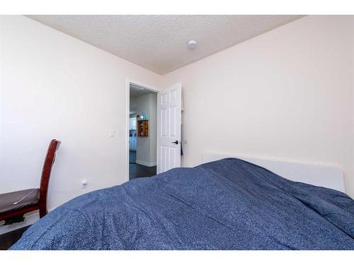 55 Falchurch Road Ne, Calgary, AB - Indoor Photo Showing Bedroom