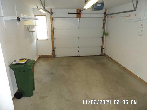 405 Hope Bay, Rural Rocky View County, AB - Indoor Photo Showing Garage