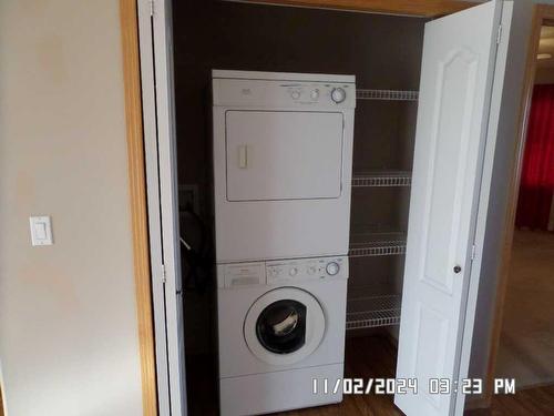 405 Hope Bay, Rural Rocky View County, AB - Indoor Photo Showing Laundry Room