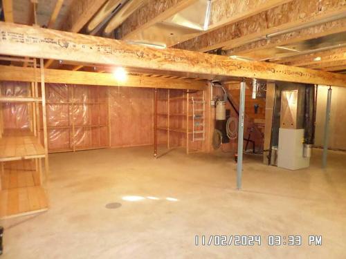 405 Hope Bay, Rural Rocky View County, AB - Indoor Photo Showing Basement