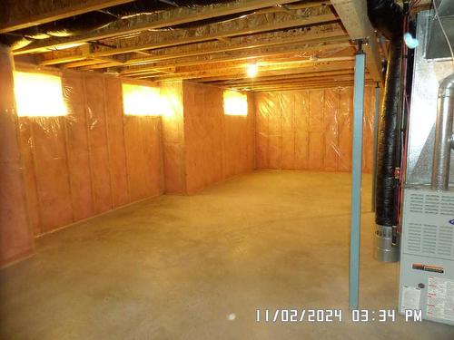 405 Hope Bay, Rural Rocky View County, AB - Indoor Photo Showing Basement