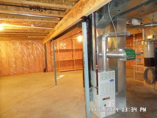 405 Hope Bay, Rural Rocky View County, AB - Indoor Photo Showing Basement