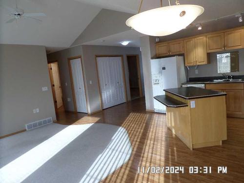 405 Hope Bay, Rural Rocky View County, AB - Indoor Photo Showing Kitchen With Double Sink