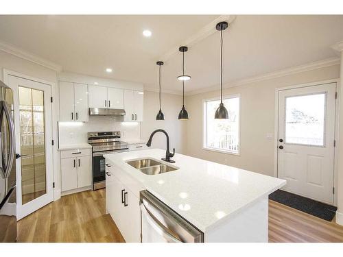 41 Valley Crest Close Nw, Calgary, AB - Indoor Photo Showing Kitchen With Double Sink With Upgraded Kitchen