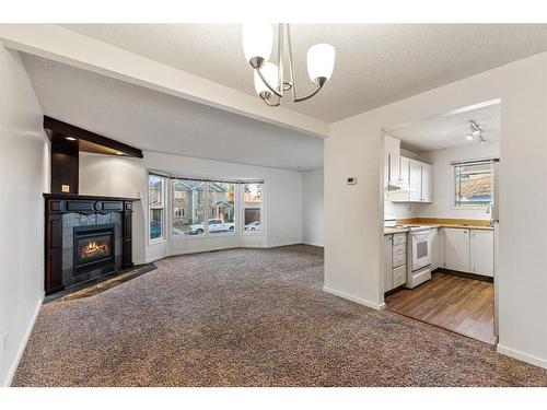 4624 81 Street Nw, Calgary, AB - Indoor With Fireplace